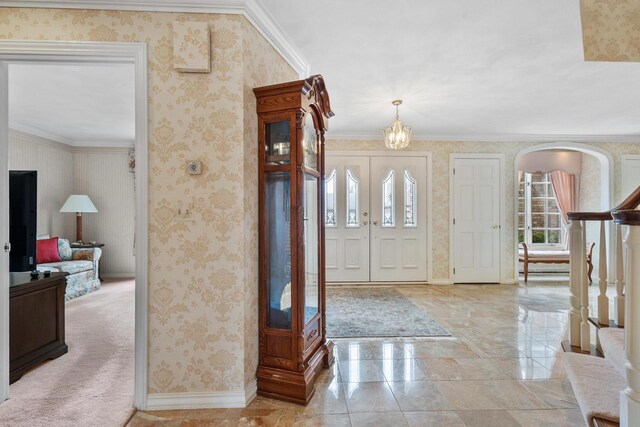 1012 E Kramer Ln, Appleton, WI 54915 - entrance foyer with wallpapered walls, baseboards, and ornamental molding