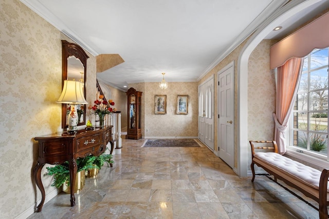 1012 E Kramer Ln, Appleton, WI 54915 - foyer entrance with crown molding, baseboards, a notable chandelier, and wallpapered walls