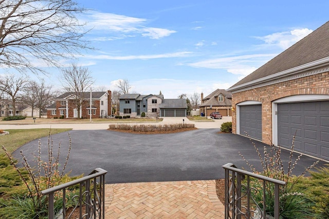 1012 E Kramer Ln, Appleton, WI 54915 - view of road with aphalt driveway and a residential view