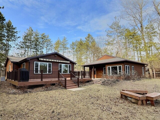 N9378 21st Ave, Neshkoro, WI 54960 - back of house featuring a deck
