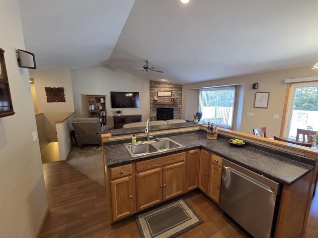 246 Golliher Ct, Westfield, WI 53964 - kitchen with a stone fireplace, a ceiling fan, a healthy amount of sunlight, stainless steel dishwasher, and a sink