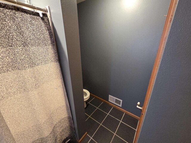 246 Golliher Ct, Westfield, WI 53964 - room details featuring visible vents, baseboards, and toilet