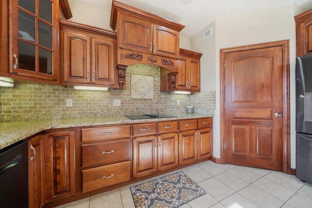 3895 Shorebird Ct, Oshkosh, WI 54904 - kitchen featuring black electric stovetop, glass insert cabinets, backsplash, light stone countertops, and dishwashing machine