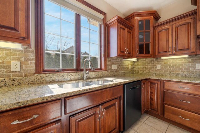 3895 Shorebird Ct, Oshkosh, WI 54904 - kitchen featuring tasteful backsplash, light tile patterned floors, a sink, and black dishwasher