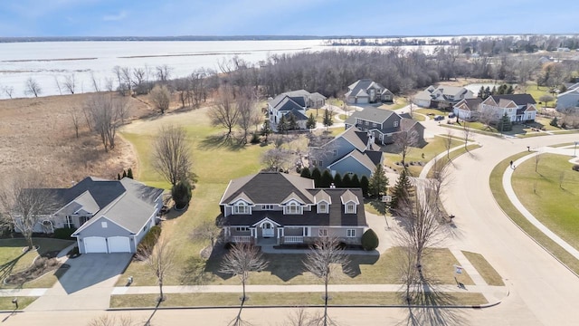 3895 Shorebird Ct, Oshkosh, WI 54904 - drone / aerial view featuring a water view and a residential view