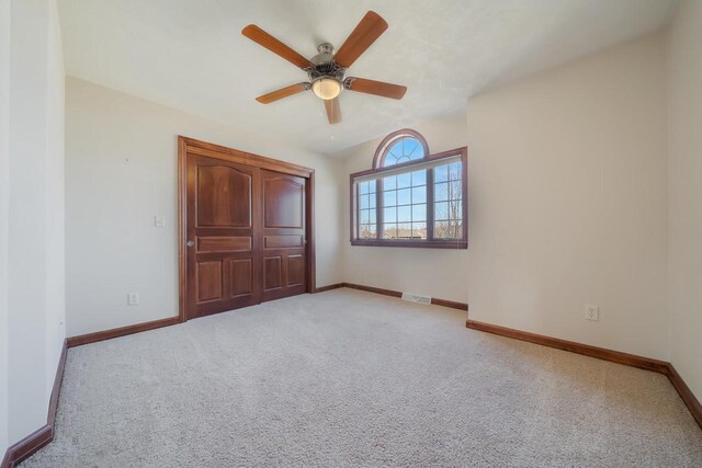 3895 Shorebird Ct, Oshkosh, WI 54904 - unfurnished bedroom featuring carpet floors, baseboards, and visible vents