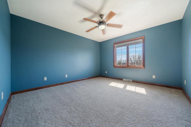 3895 Shorebird Ct, Oshkosh, WI 54904 - carpeted empty room featuring ceiling fan, baseboards, and visible vents