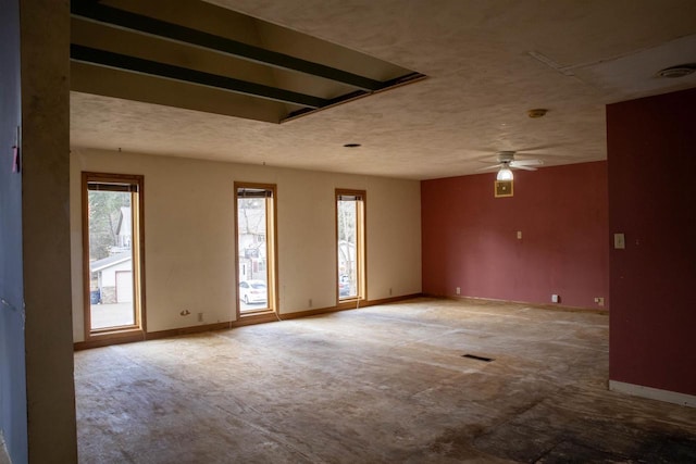 2940 Plover Springs Dr, Plover, WI 54467 - unfurnished room featuring visible vents, baseboards, and a ceiling fan