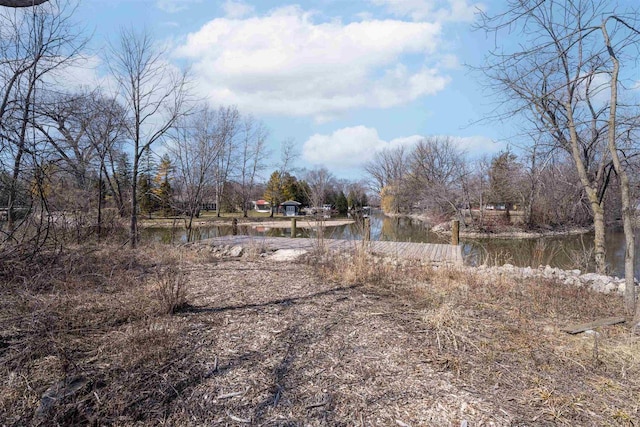 view of yard featuring a water view