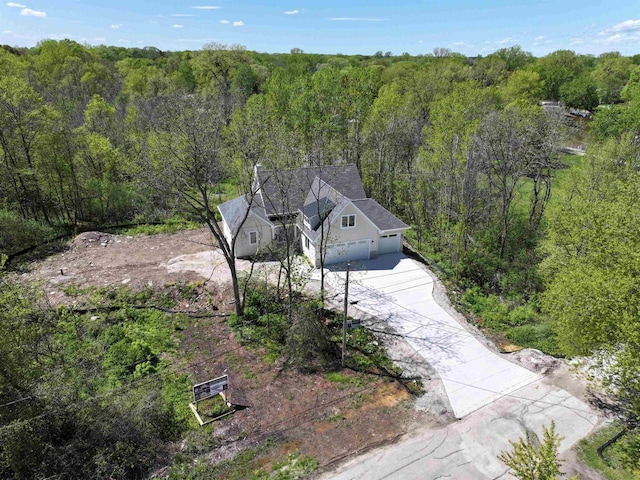 bird's eye view with a view of trees
