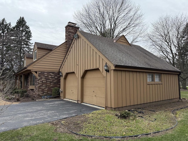 garage featuring driveway
