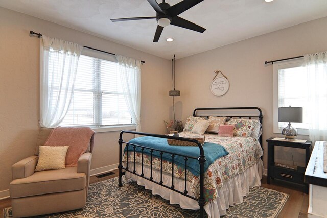 1817 Arboretum Dr, Janesville, WI 53548 - bedroom featuring visible vents, baseboards, a ceiling fan, recessed lighting, and wood finished floors