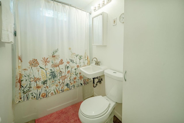 106 Leon St, Madison, WI 53714 - full bathroom featuring shower / tub combo with curtain, a sink, and toilet