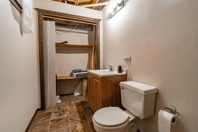 N10368 Queens Way Way, Necedah, WI 54646 - bathroom with toilet, vanity, and baseboards