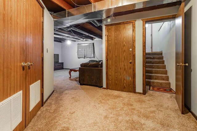 N10368 Queens Way Way, Necedah, WI 54646 - finished below grade area with carpet, visible vents, and stairway