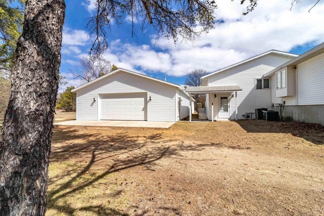 N10368 Queens Way Way, Necedah, WI 54646 - view of front of house with an outbuilding and dirt driveway