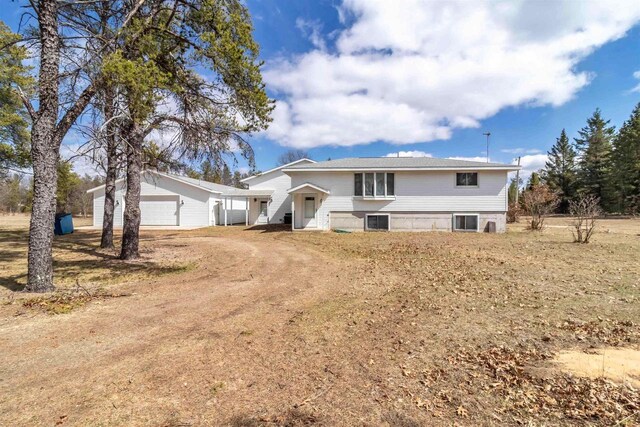 N10368 Queens Way Way, Necedah, WI 54646 - raised ranch featuring an attached garage