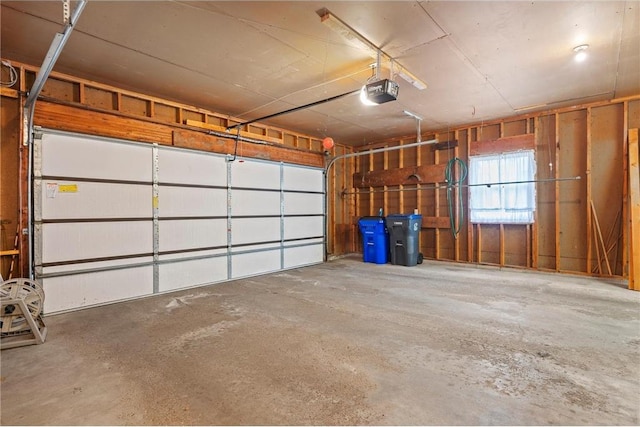 garage featuring a garage door opener