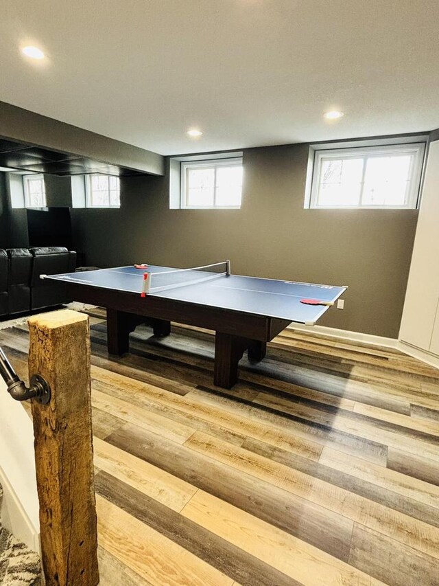 W330S8380 Isabelle Dr, Mukwonago, WI 53149 - playroom featuring wood finished floors and recessed lighting
