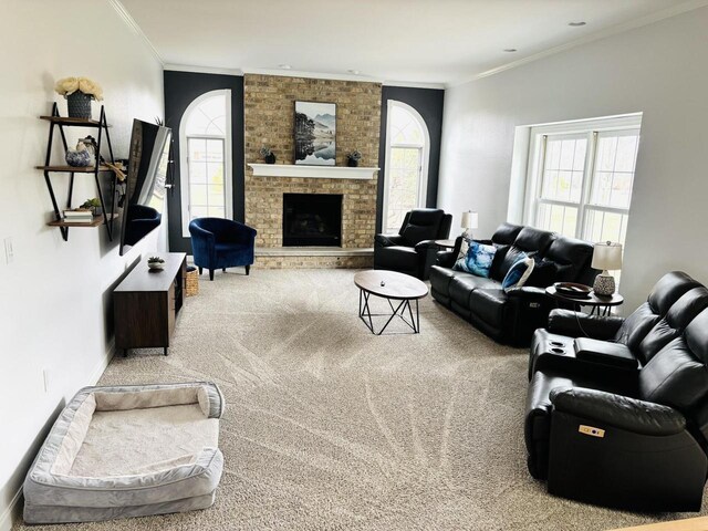 W330S8380 Isabelle Dr, Mukwonago, WI 53149 - living room featuring a fireplace, carpet flooring, baseboards, and ornamental molding