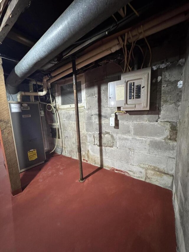 unfinished below grade area with electric panel