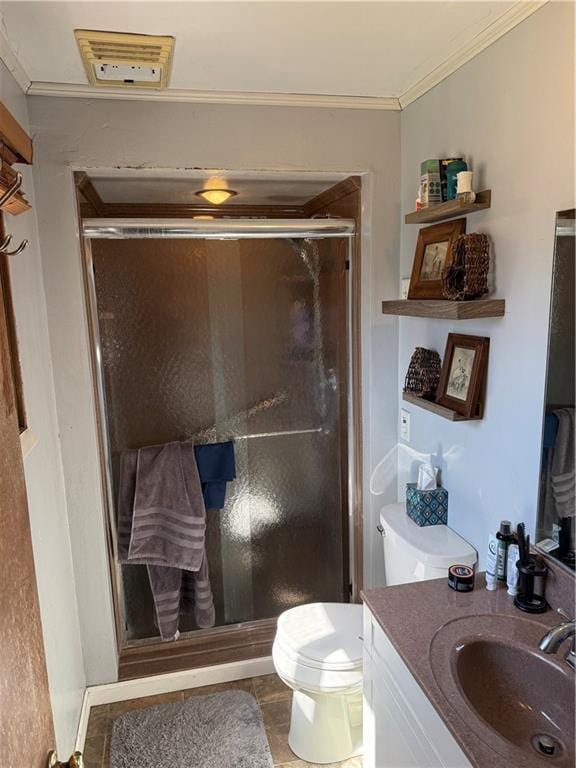 1637 Skeels Ave, Eau Claire, WI 54701 - bathroom featuring vanity, ornamental molding, a shower stall, and toilet