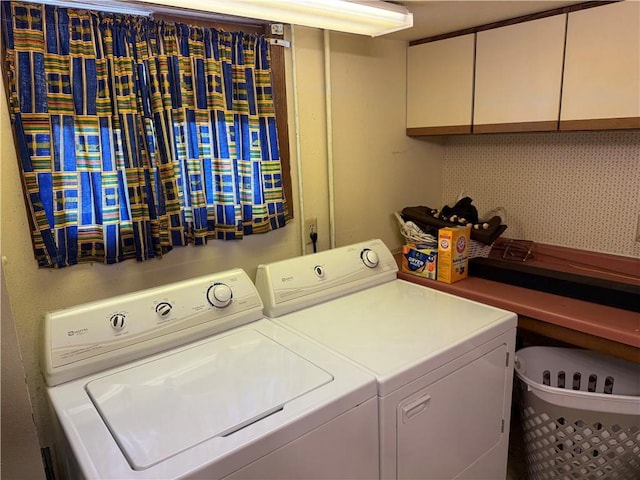 1637 Skeels Ave, Eau Claire, WI 54701 - clothes washing area featuring cabinet space and separate washer and dryer
