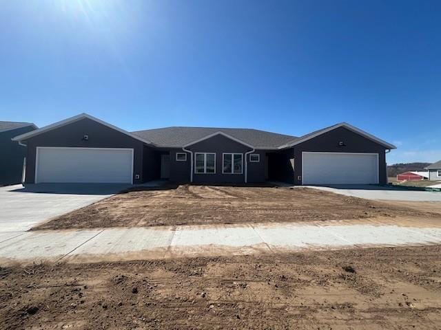 2465 Russell Ct, Reedsburg, WI 53959 - single story home with an attached garage and driveway