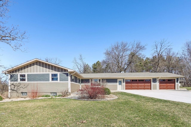 N3759 Airport Rd, Cambridge, WI 53523 - ranch-style house featuring concrete driveway, a front lawn, and an attached garage