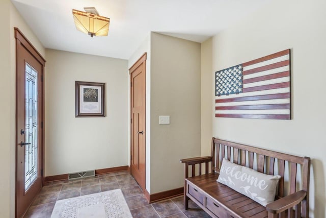 N3759 Airport Rd, Cambridge, WI 53523 - entrance foyer featuring a wealth of natural light, visible vents, and baseboards