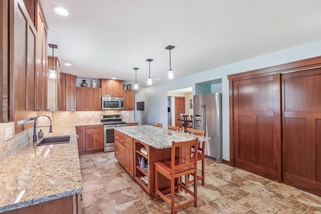 N3759 Airport Rd, Cambridge, WI 53523 - kitchen featuring open shelves, a center island, appliances with stainless steel finishes, a sink, and decorative backsplash