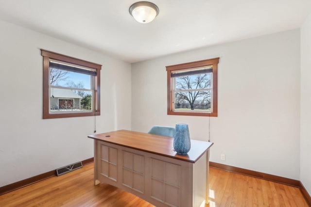 N3759 Airport Rd, Cambridge, WI 53523 - office space with visible vents, light wood-style flooring, and baseboards