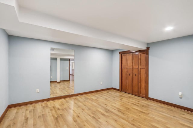 N3759 Airport Rd, Cambridge, WI 53523 - unfurnished bedroom featuring a closet, baseboards, and light wood-type flooring