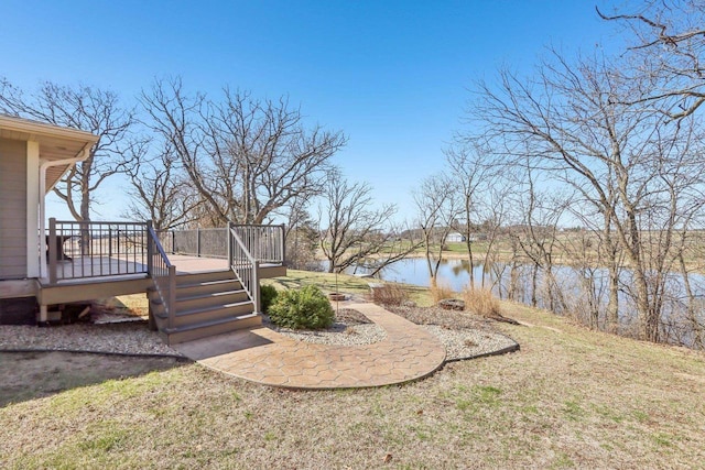 N3759 Airport Rd, Cambridge, WI 53523 - view of yard featuring a deck with water view