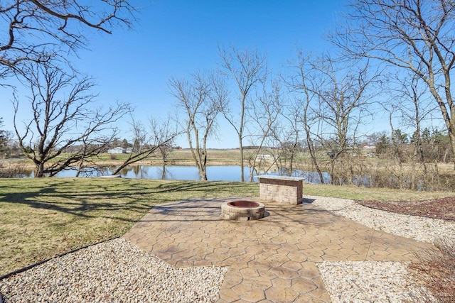 N3759 Airport Rd, Cambridge, WI 53523 - view of patio / terrace featuring a fire pit and a water view