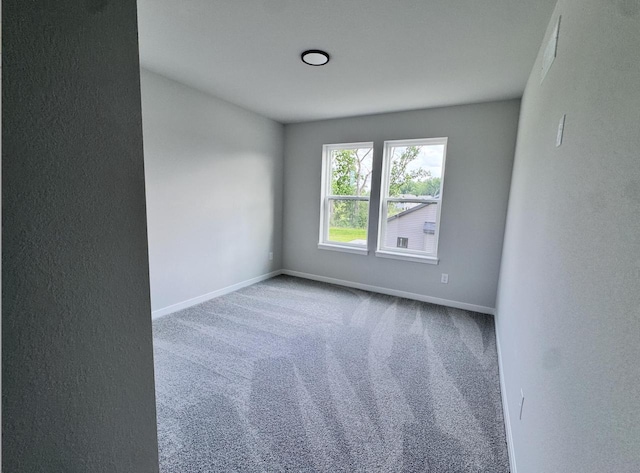 333 Kiddle Ln, Union Grove, WI 53182 - carpeted spare room with baseboards and a textured wall