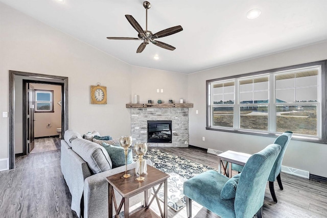 665 Kroll Rd, Pulaski, WI 54162 - living room with vaulted ceiling, a ceiling fan, wood finished floors, baseboards, and plenty of natural light
