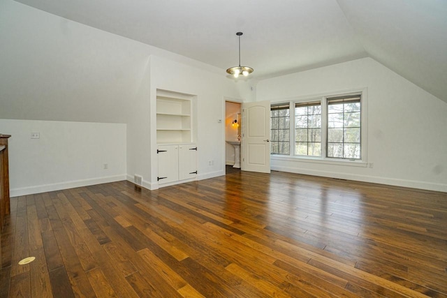 6579 Maple Tree Rd, Crescent, WI 54501 - bonus room with dark wood-type flooring, built in features, baseboards, and lofted ceiling
