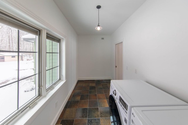 6579 Maple Tree Rd, Crescent, WI 54501 - washroom featuring stone finish flooring, independent washer and dryer, laundry area, and baseboards