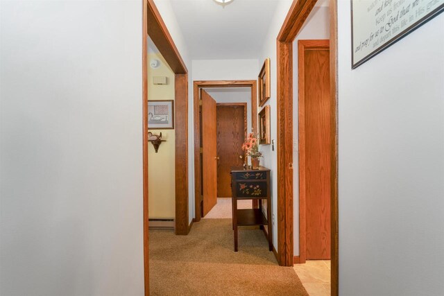 N5120 Summit Ct, Fond Du Lac, WI 54937 - corridor with a baseboard radiator and light carpet