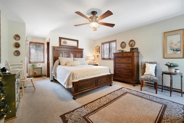 N5120 Summit Ct, Fond Du Lac, WI 54937 - bedroom featuring a baseboard radiator, light colored carpet, and ceiling fan