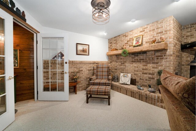 N5120 Summit Ct, Fond Du Lac, WI 54937 - sitting room featuring french doors, carpet, and brick wall