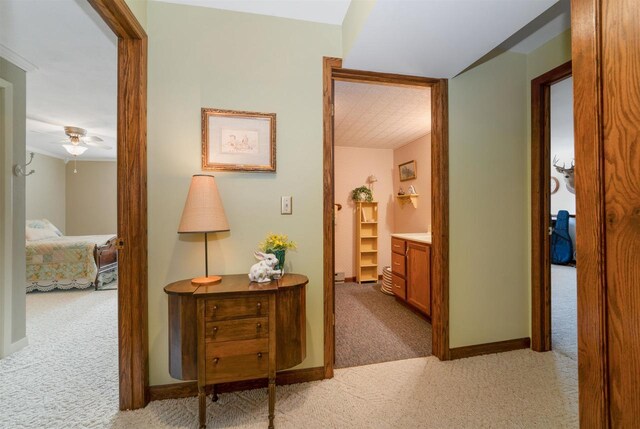 N5120 Summit Ct, Fond Du Lac, WI 54937 - hall featuring baseboards and light carpet