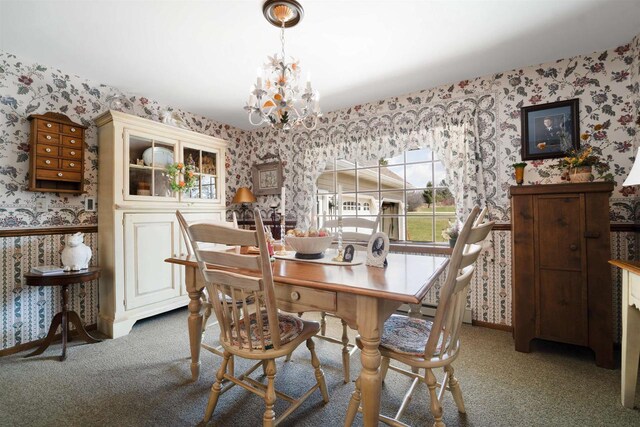 N5120 Summit Ct, Fond Du Lac, WI 54937 - dining room with wallpapered walls, a notable chandelier, wainscoting, and carpet floors