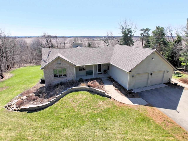 ranch-style home featuring aphalt driveway, a shingled roof, a porch, a front lawn, and a garage