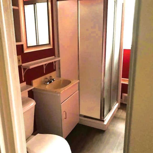1708 5th St, Menomonie, WI 54751 - full bath with toilet, a stall shower, and vanity