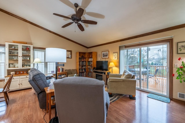 421 Nature Haven Blvd Unit 15, Kewaskum, WI 53040 - living area featuring a wealth of natural light, a ceiling fan, and light wood-style flooring