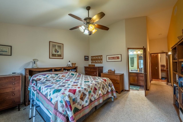 421 Nature Haven Blvd Unit 15, Kewaskum, WI 53040 - bedroom with connected bathroom, light colored carpet, vaulted ceiling, visible vents, and a ceiling fan