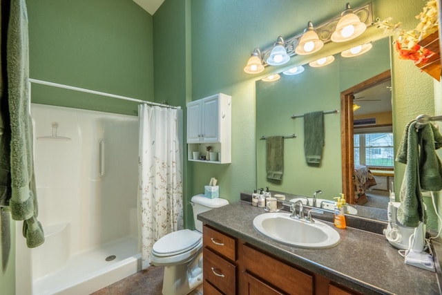 421 Nature Haven Blvd Unit 15, Kewaskum, WI 53040 - bathroom featuring toilet, a stall shower, tile patterned flooring, and vanity