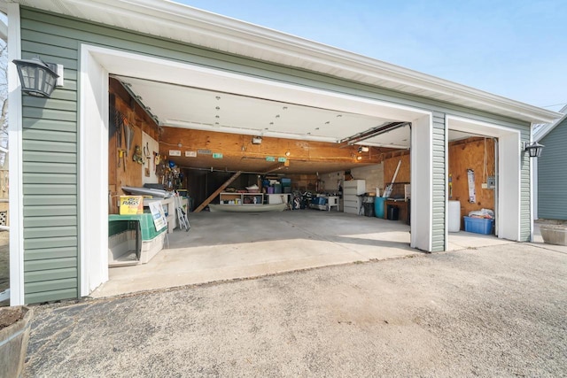 131 Madison Ave, Omro, WI 54963 - garage with aphalt driveway